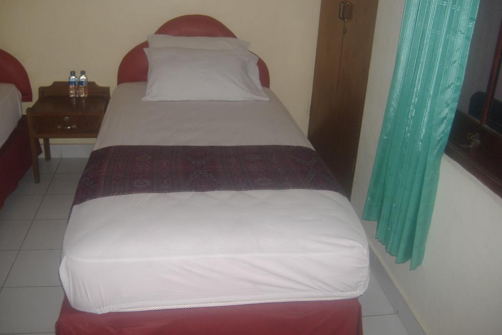 Mustika Inn Kuta Lombok Habitación foto