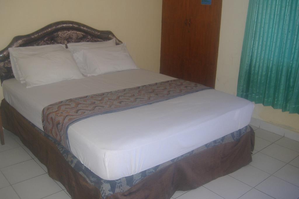 Mustika Inn Kuta Lombok Habitación foto