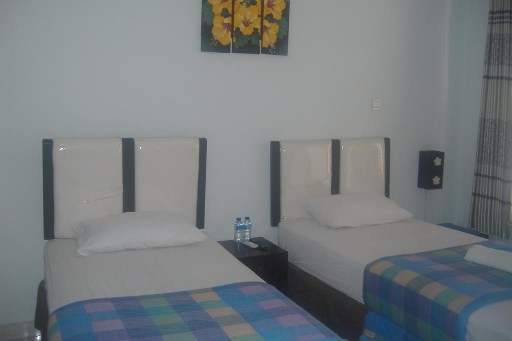 Mustika Inn Kuta Lombok Habitación foto