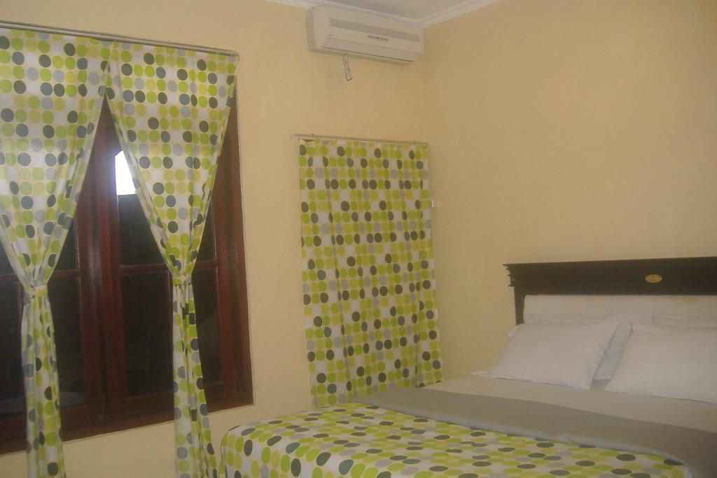 Mustika Inn Kuta Lombok Habitación foto