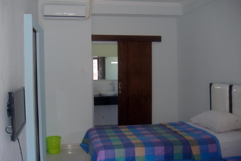 Mustika Inn Kuta Lombok Habitación foto