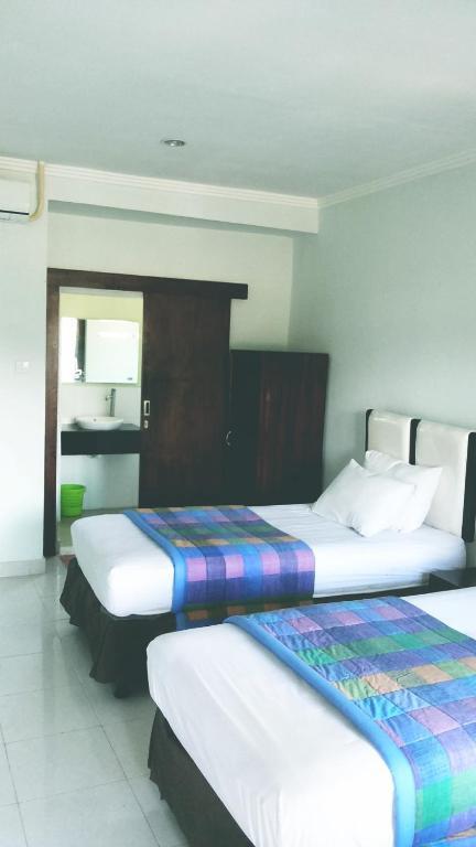 Mustika Inn Kuta Lombok Habitación foto