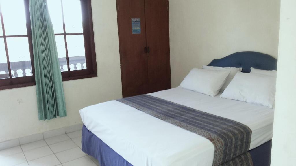 Mustika Inn Kuta Lombok Habitación foto