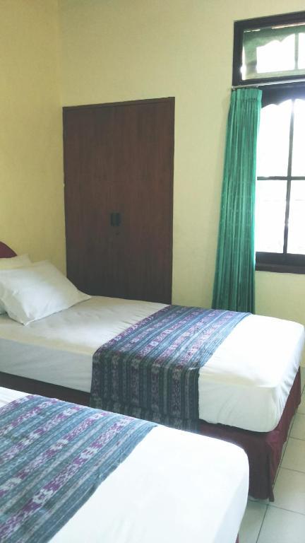Mustika Inn Kuta Lombok Habitación foto
