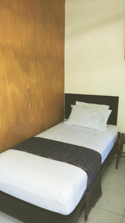 Mustika Inn Kuta Lombok Habitación foto